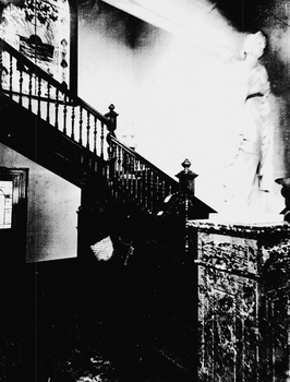 Black and White photo of the staircase and statue