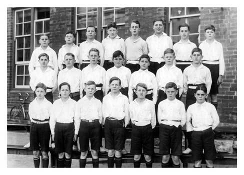 Black and White photo of Gordon Glover and the Gravel Hill School Choir. Gordon is in the back row fourth from the left.