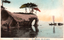 This coloured card shows a natural rock arch topped with pine trees beside a sailing boat: On the card is printed “Matsushima (3.views of Japan.) The Japanese translates as “Udegasaki, Matsushima—one of the Three Scenic Views of Japan.”