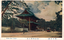 This coloured card shows a temple gate beside a road with a tram and pedestrians: On the card is printed “Shiba Park Tokyo" The Japanese translates as “Zōjōji Temple in Shiba Park—a famous place in Tokyo.”