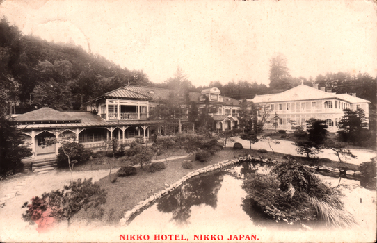 This black-and-white card shows a large hotel complex and landscaped garden beside a pond: On the card is printed “NIKKO HOTEL, NIKKO JAPAN.”