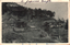 This black-and-white card shows temple buildings on a wooded hillside. On the card is printed “寺　生　往　（勝名寺光善）”. A handwritten note reads “A Japanese temple.”
The Japanese is read from right to left:
往生寺（善光寺名勝）」 — “Ōjōji Temple (a famous sight of Zenkō-ji).”