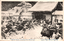 This black-and-white card shows armed men fighting in a snow-covered courtyard. On the card is printed “The 47 Ronins Attacking Kira’s Residence”. The Japanese is printed from right to left and reads: 義士襲門討入　總大將 大石主稅」 — “The loyal retainers storming the gate during the raid; commander-in-chief Ōishi Chikara.”