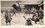 11731.110 This black-and-white card shows armed Japanese samurai attacking a residence in the snow. On the card is printed “The 47 Ronins Attacking Kira's Residence” The Japanese is printed right-to-left. Read in modern order, it is: 義士討入（其一）English translation: “The loyal retainers’ attack (Part One).”