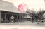 This black-and-white card shows a temple courtyard with large temple buildings, stone lanterns and visitors. On the card is printed “NISHIHONGANJI KYOTO.” The Japanese 京都西本願寺 translates as “Nishi Honganji, Kyoto” or “West Hongan Temple, Kyoto.”