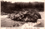 This black-and-white card shows a rocky river scene with fast-moving water and wooded banks. On the card is printed “VIEW OF KAMUIKOTAN, HOKKAIDO NO 3” and “（北海道）壯快ナル神居古潭ノ真景（其三）”. The Japanese translates as “True view of the magnificent Kamui Kotan, Hokkaido (No. 3).”