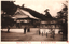 This black-and-white card shows a temple complex with several people standing in the grounds. On the card is printed “Sumadera Temple, Suma.” and “攝州須磨寺全景”. The Japanese 攝州須磨寺全景 translates as “Complete view of Sumadera Temple, Settsu Province.”