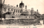 This black-and-white card shows a large government building beside a canal, with pedestrians and boats. On the card is printed “The Dept. of Communications.”, “遞信省” and “（東京名所）”. The Japanese translates as:
遞信省 — “Ministry of Communications”
東京名所 — “Famous places of Tokyo” / “Tokyo sights”