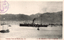 This black-and-white card shows Kobe harbour with a steamship and smaller boats, with the city and mountains beyond. On the card is printed “General View of Kobe city (1)” and “神戸港内ヨリ見タル市街全景（其一）”. The Japanese 神戸港内ヨリ見タル市街全景（其一） translates as “Complete view of the city seen from inside Kobe Harbour (No. 1).”