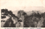 This black-and-white card shows steep rocky mountain formations with pine trees. On the card is printed “The Nakanotake, myōgi Mountain.” and “（妙義山名所）中ノ嶽大砲岩ヨリ荒船山ノ遠望”. The Japanese translates as:
妙義山名所 — “Famous sights of Mount Myōgi”
中ノ嶽大砲岩ヨリ荒船山ノ遠望 — “Distant view of Mount Arafune from Cannon Rock at Nakanotake.”