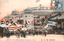 This coloured card shows a crowded street outside a large arena building decorated with flags. On the card is printed “(No.107) The Wrestle Room Kokugikan, Tokyo.”, “國技館” and “（東京名所）”. The Japanese translates as:
國技館 — “Kokugikan” / “National Sports Hall”
東京名所 — “Famous places of Tokyo” / “Tokyo sights”