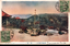 This coloured card shows a landscaped hilltop park or garden overlooking the sea. On the card is printed “淡輪遊園山上ヨリ海ヲ望ム” and there is handwritten English reading “Tannowa Park.” Japanese translation: 淡輪遊園山上ヨリ海ヲ望ム — “View of the sea from the hilltop of Tannowa Park.” The small parenthetical publisher inscription at lower left appears to read “（進文堂發行）”, meaning “Published by Shinbundō/Shinmundō.”