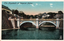 This coloured card shows a bridge over the moat at the Imperial Palace, with palace buildings and stone walls beyond. On the card is printed “The Niyyubashi of Imperial Palace.”