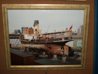 Photograph - Framed Photograph, S.T.Wattle up on blocks at 19 South Wharf at commencement of restoration. October 2009, 10/2009