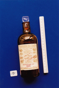 Chloroform bottle used by Dr Mitchell Henry O'Sullivan, W.J. Bush & Co