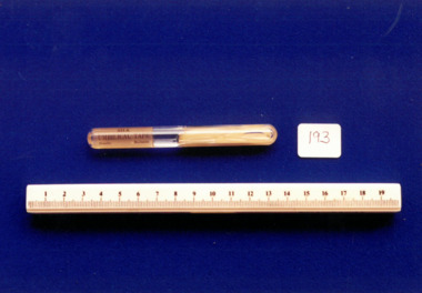 Silk umbilical tape in glass vial used by Dr Mitchell Henry O'Sullivan, Allen & Hanburys, England