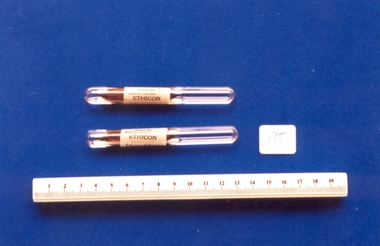 Two glass vials of 'Ethicon' catgut #3 used by Dr Mitchell Henry O'Sullivan, Ethicon