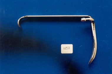 Tongue depressor with anaesthetic tube attachment used by Dr Lorna Lloyd-Green