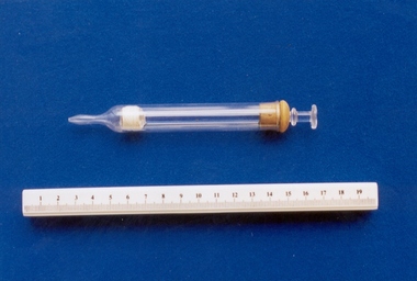Glass wound irrigator syringe associated with midwife Mary Howlett, c. 1866 - 1920