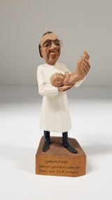 Sculpture - Carved wooden figurine of an obstetrician, Germany, Jaschke Pretzl, c. 1950s