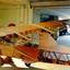 Stripped glider airframe in workshop undergoing repair