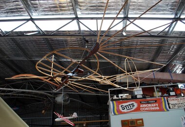 Airframe without fabric covering suspended in hangar