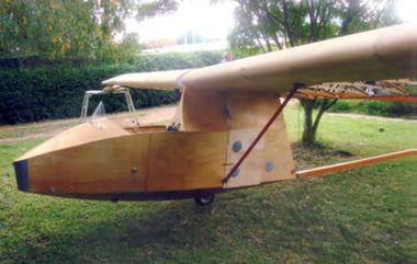 Side view of wooden partly constructed glider