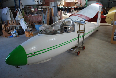 Green and white glider fuselage 