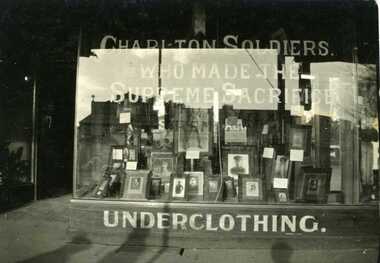 Wylies' store front window displaying photos of Charlton Soldiers. Sign in window reads "Charlton Soldiers who made the supreme sacrifice'