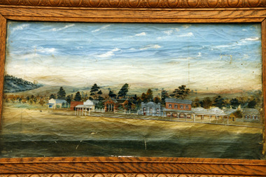 Framed painting of the east end, south side of High St Charlton. Shows 10 buildings; general store, etc and Tribune Office
