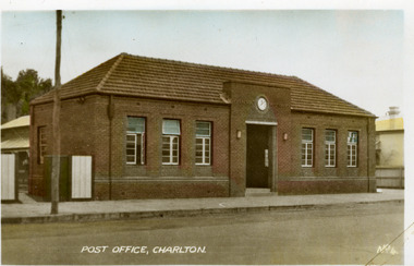 Brick Post Office building. Three windows on each side of the central entrance. Clock above the entrance.  Text at the bottom of the postcard says POST OFFICE, CHARLTON. No. 4.