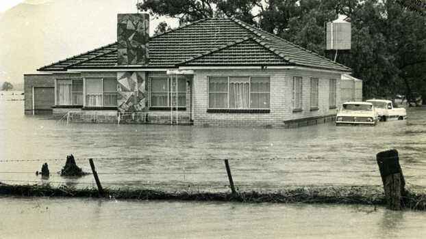 1973 Flood, W. Fitzpatrick's hause or Calder Hwy, surrounded by flood water from flooded Yeungroon Creek.