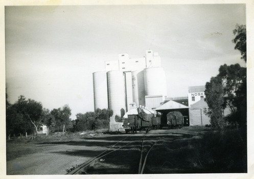 View of Mill and Silos along the railway tracks.