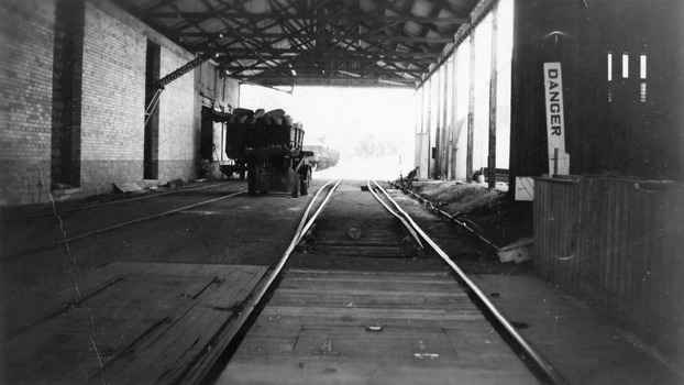 Looking down railway tracks at the siding in Noske's flour mill. 