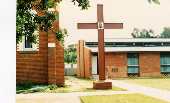 Bell tower in the shape of a cross.