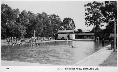 Swimming pool with a number of people doing exercises. 