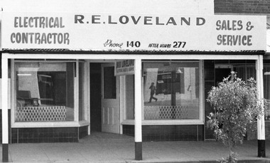 Front of Store for electrical contractor. Sign reads R.E. Loveland.