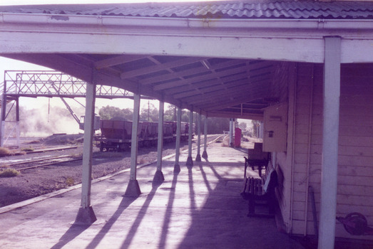 View along the station platform looking under the veranda. 
