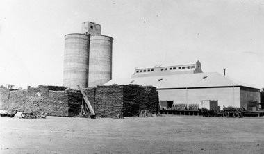 Photograph, Noske Flour Mill with sacks of bagged wheat C.1938
