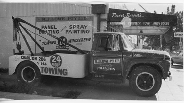 Photograph - Black and white photo of tow truck belonging to R.J. Lowe Pty. Ltd
