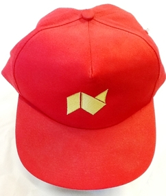 Red cap with NMCOT logo, Red cap with Northern Metropolitan College of TAFE logo, 1988