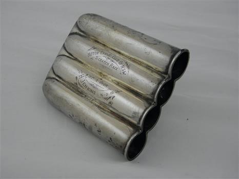 Cigar holder awarded as trophy to Harry Jenkins with inscription Motorcycle Club of NSW Scratch Race 16-2-10. Made from silver and holds 4 cigars.