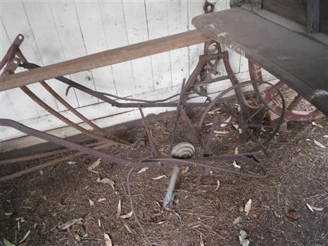 hand seeder standing in the barn