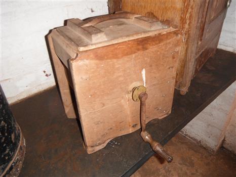 photograph of butter churn in situ