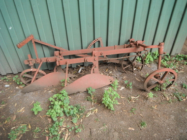 photograph of double furrow mould board plough
