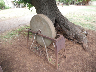 photograph of grindstone in situ