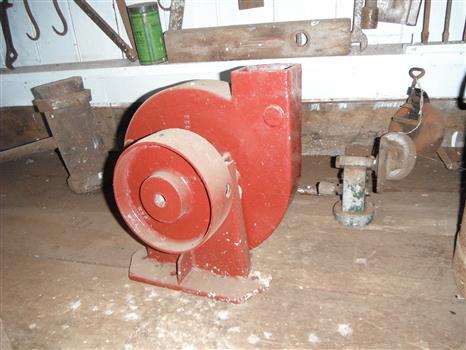 Photograph of red forge blower in situ