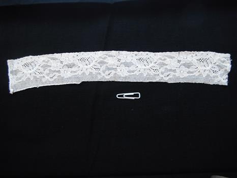 photograph of lace trim on black