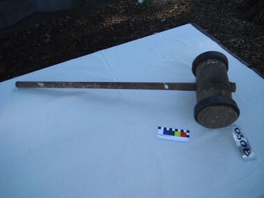 an iron bound wooden mallet