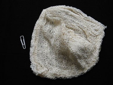 photograph of a baby's bonnet